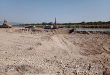 विकासको नाममा खोलामा बडेमानका खाल्डा